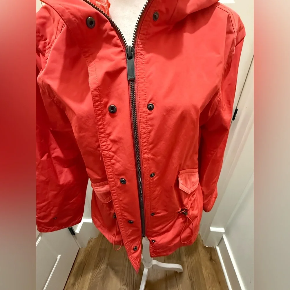 Coach. Utility Rain Jacket. Coral. Size XS.